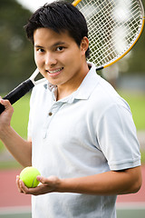 Image showing Young asian tennis player