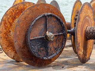 Image showing Rusty, old winch drums