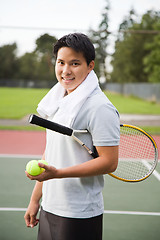 Image showing Young asian tennis player