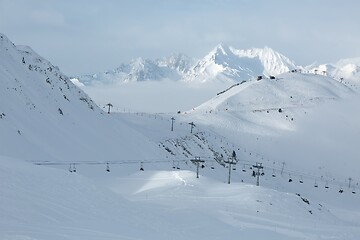 Image showing Snowy skiing slopes from the top