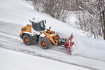 Image showing Winter road clearing snowplow