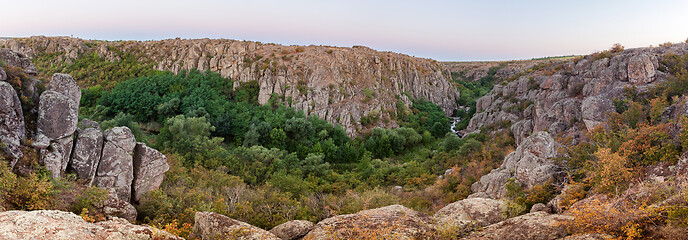 Image showing Panoramic photo of stunning landscape with with canyon.