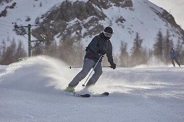 Image showing Skiing in the winter snowy slopes