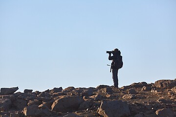 Image showing Standing on a cliff