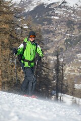 Image showing Skiing in the winter snowy slopes