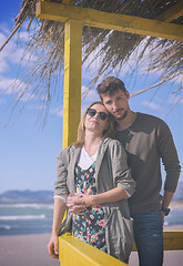 Image showing Couple chating and having fun at beach bar