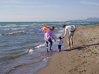 Image showing happy family enjoying vecation during autumn day