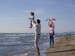 Image showing happy family enjoying vecation during autumn day