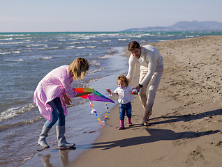 Image showing happy family enjoying vecation during autumn day