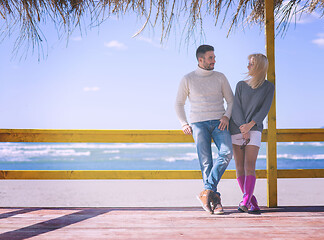 Image showing Couple chating and having fun at beach bar