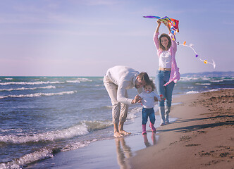 Image showing happy family enjoying vecation during autumn day