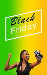 Image showing Beautiful woman inviting for shopping in black friday, sales concept. Vertical flyer, gradient background