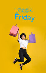 Image showing Beautiful woman inviting for shopping in black friday, sales concept. Vertical flyer, yellow background