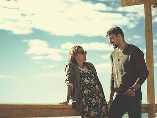 Image showing Couple chating and having fun at beach bar