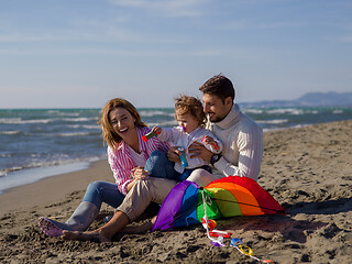 Image showing Young family enjoying vecation during autumn day