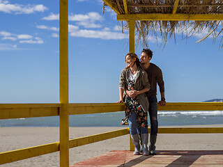 Image showing Couple chating and having fun at beach bar