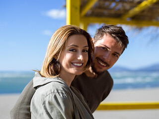 Image showing Couple chating and having fun at beach bar