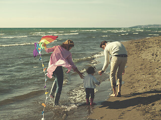 Image showing happy family enjoying vecation during autumn day