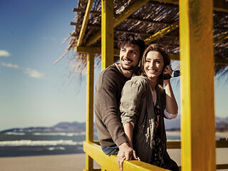 Image showing Couple chating and having fun at beach bar