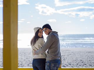 Image showing Couple chating and having fun at beach bar