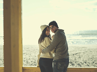 Image showing Couple chating and having fun at beach bar