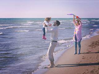 Image showing happy family enjoying vecation during autumn day