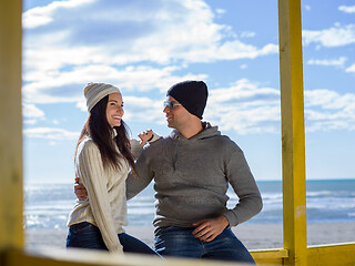 Image showing Couple chating and having fun at beach bar