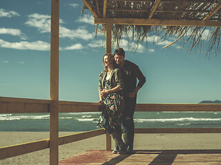 Image showing Couple chating and having fun at beach bar