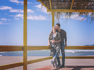 Image showing Couple chating and having fun at beach bar