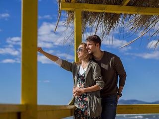 Image showing Couple chating and having fun at beach bar