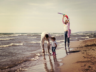 Image showing happy family enjoying vecation during autumn day