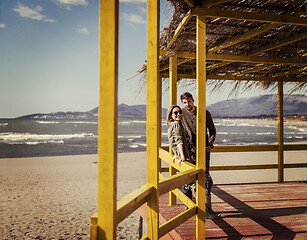 Image showing Couple chating and having fun at beach bar