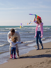 Image showing happy family enjoying vecation during autumn day