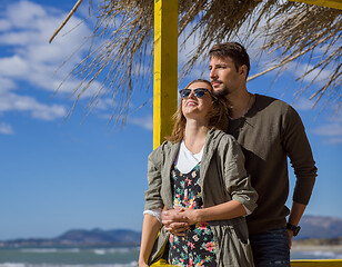 Image showing Couple chating and having fun at beach bar