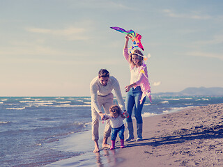 Image showing happy family enjoying vecation during autumn day