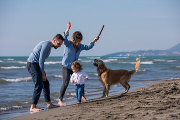 Image showing happy young family enjoying vecation during autumn day