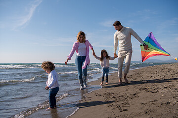 Image showing happy family enjoying vecation during autumn day