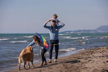 Image showing happy young family enjoying vecation during autumn day