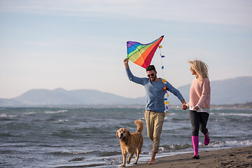 Image showing happy couple enjoying time together at beach