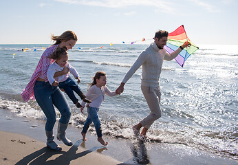 Image showing happy family enjoying vecation during autumn day