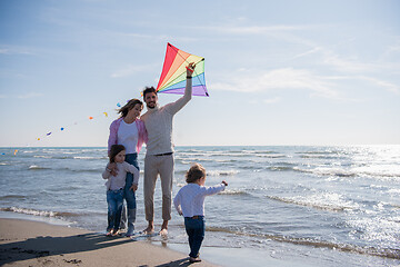 Image showing happy family enjoying vecation during autumn day