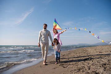 Image showing happy family enjoying vecation during autumn day