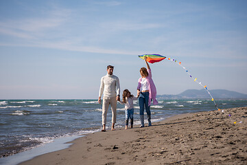 Image showing happy family enjoying vecation during autumn day