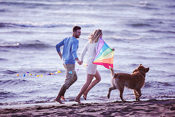 Image showing happy couple enjoying time together at beach