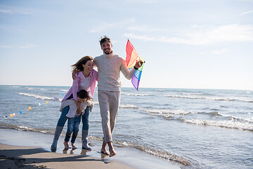 Image showing happy family enjoying vecation during autumn day