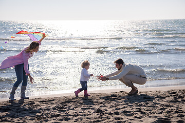 Image showing happy family enjoying vecation during autumn day