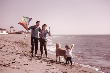 Image showing happy young family enjoying vecation during autumn day