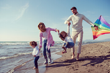 Image showing happy family enjoying vecation during autumn day