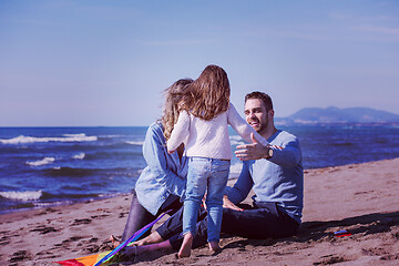 Image showing happy family enjoying vecation during autumn day