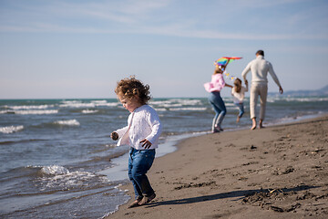 Image showing happy family enjoying vecation during autumn day